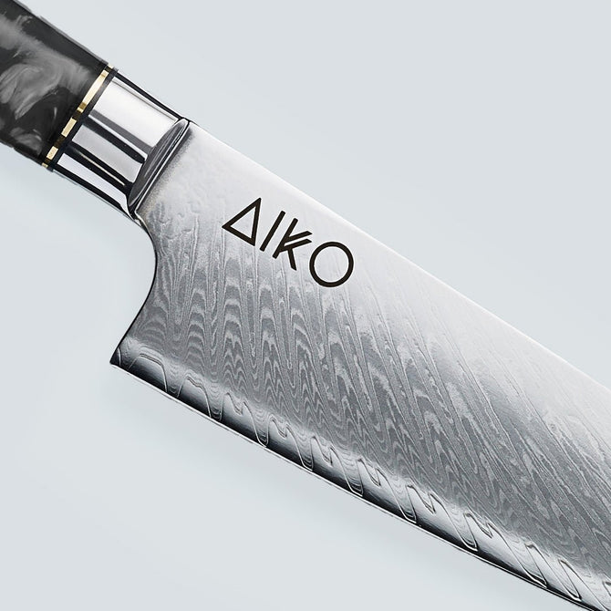 Aiko zwart Damascus stalen mes met gekleurd zwart harshandvat